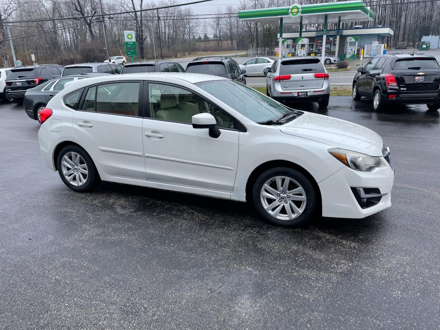 2015 White /Gray Subaru Impreza Premium (JF1GPAC62F8) with an 2.0L H4 DOHC 16V engine, Automatic transmission, located at 547 E. Main St., Orwell, OH, 44076, (440) 437-5893, 41.535435, -80.847855 - Photo#14